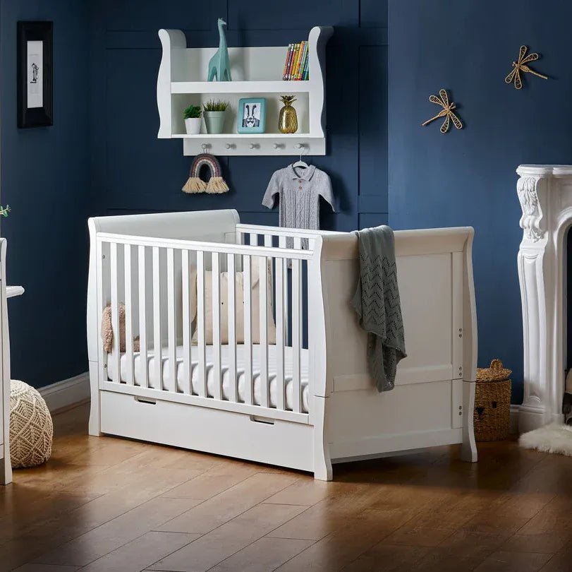 obaby-cot-beds-obaby-stamford-classic-sleigh-cot-bed-white-5055781116025-obaby-stamford-classic-sleigh-cot-bed-white-87l-drawer-included-uk-baby-centre-1253268901 Obaby Stamford Classic Sleigh Cot Bed - White - Image 1